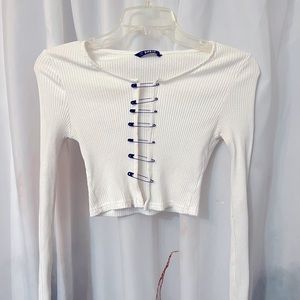 Cute white Shein top. The pins are removable.